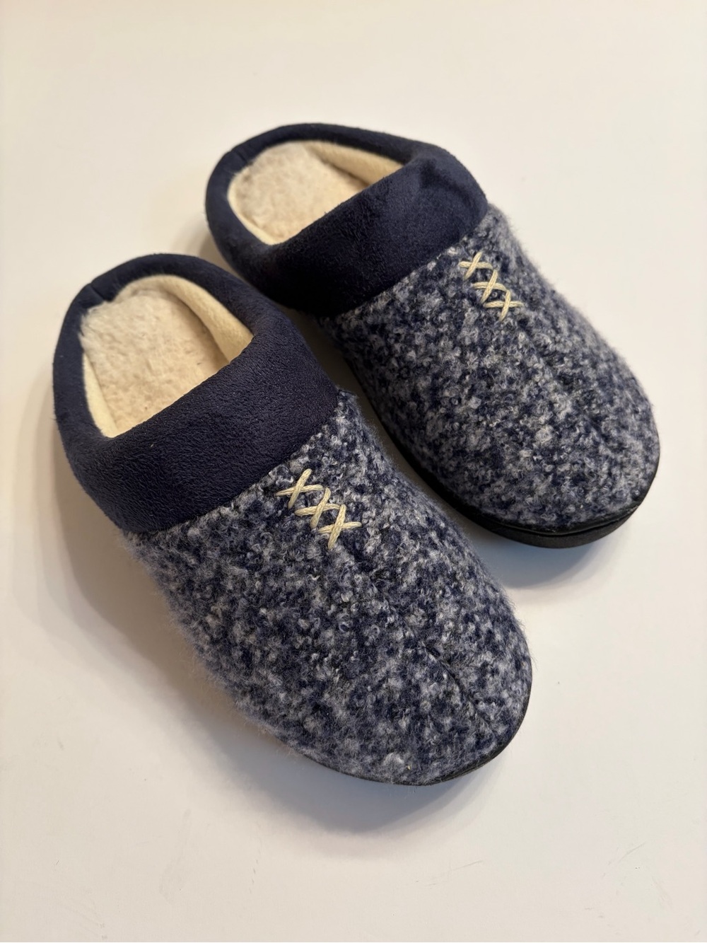 Isotoner Women’s Jessie Blue Slip-On Slippers with all around memory foam.